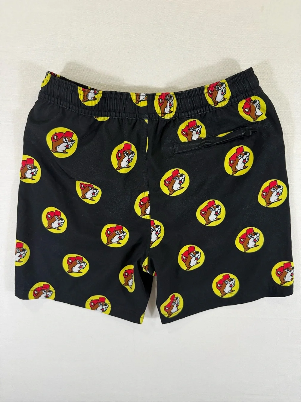 Kids Black Graphic Swim Shorts with Yellow & Red Badge Print